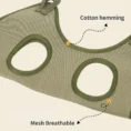 Detailed view of a green mesh breathable pet grooming hammock featuring reinforced cotton hemming for comfort.