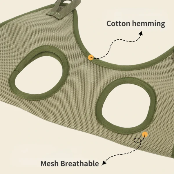 kf-S7c6a30f75626465b8f3ae9da78aae824n Detailed view of a green mesh breathable pet grooming hammock featuring reinforced cotton hemming for comfort.